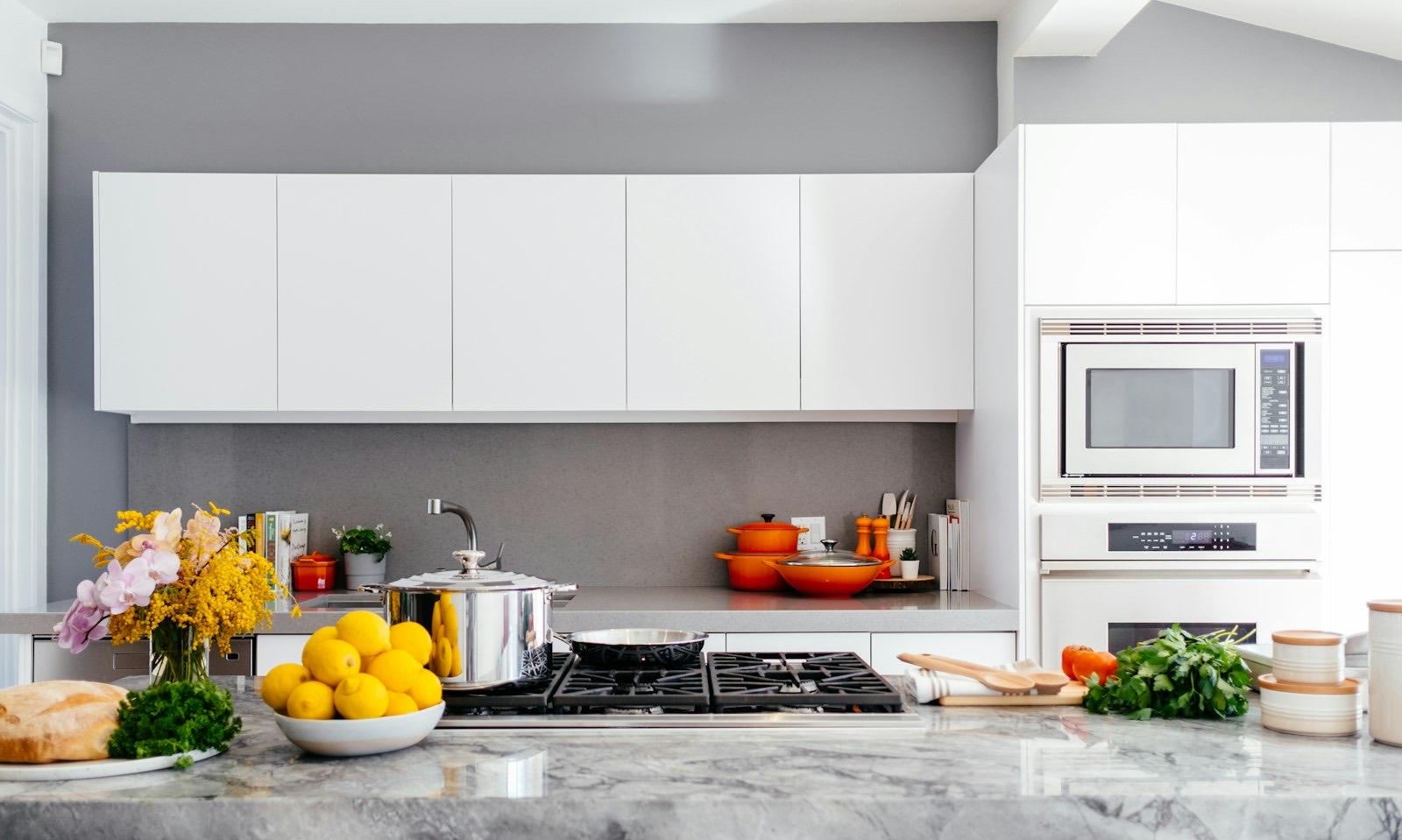 Modern kitchen with a marble island and integrated appliances