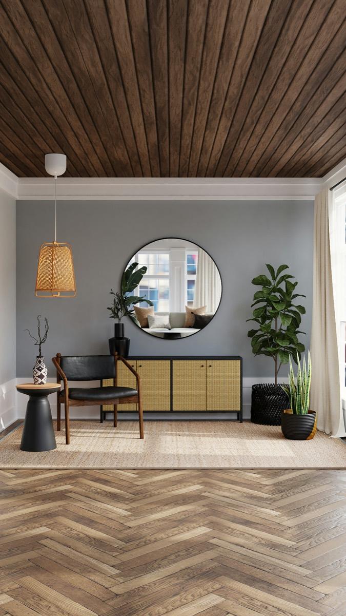 Interior with a timber-clad ceiling and herringbone floor finishes